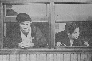 出口王仁三郎と澄子（列車の車窓）.jpg
